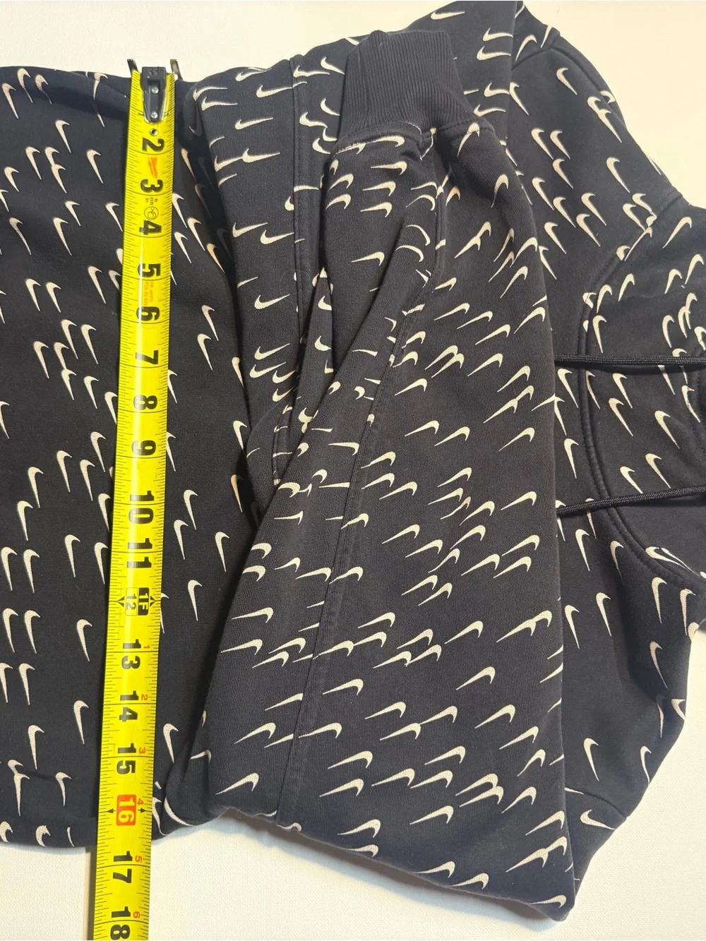 Nike‎ Black Hoodie with Repeating White Swoosh Print